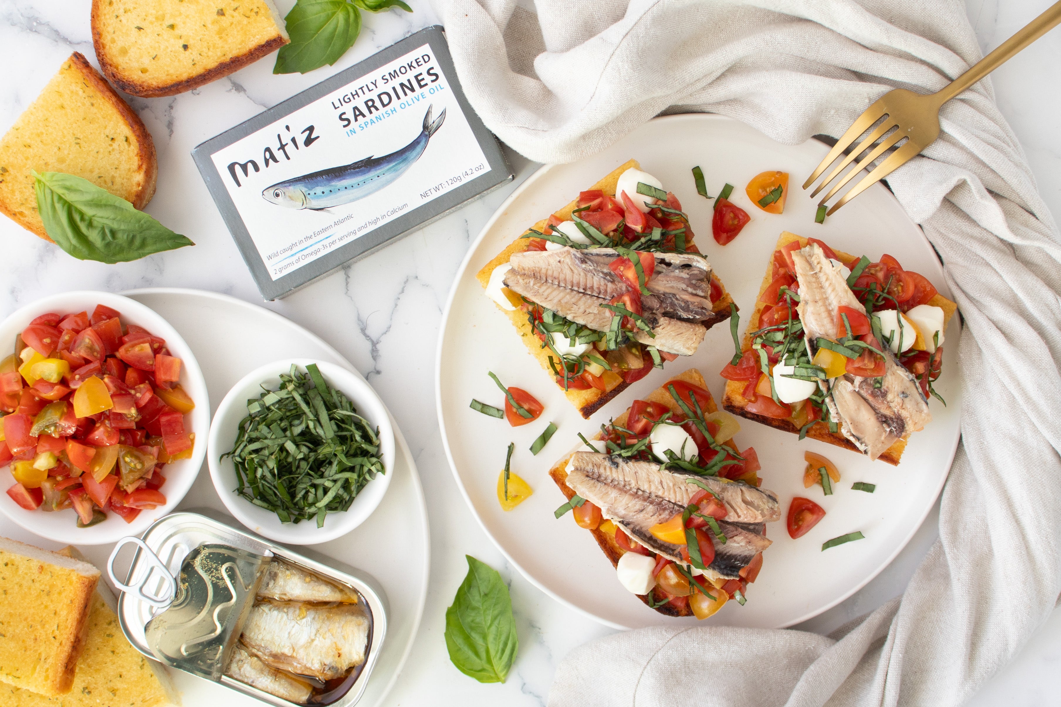 Smoky Sardine Caprese Toasts