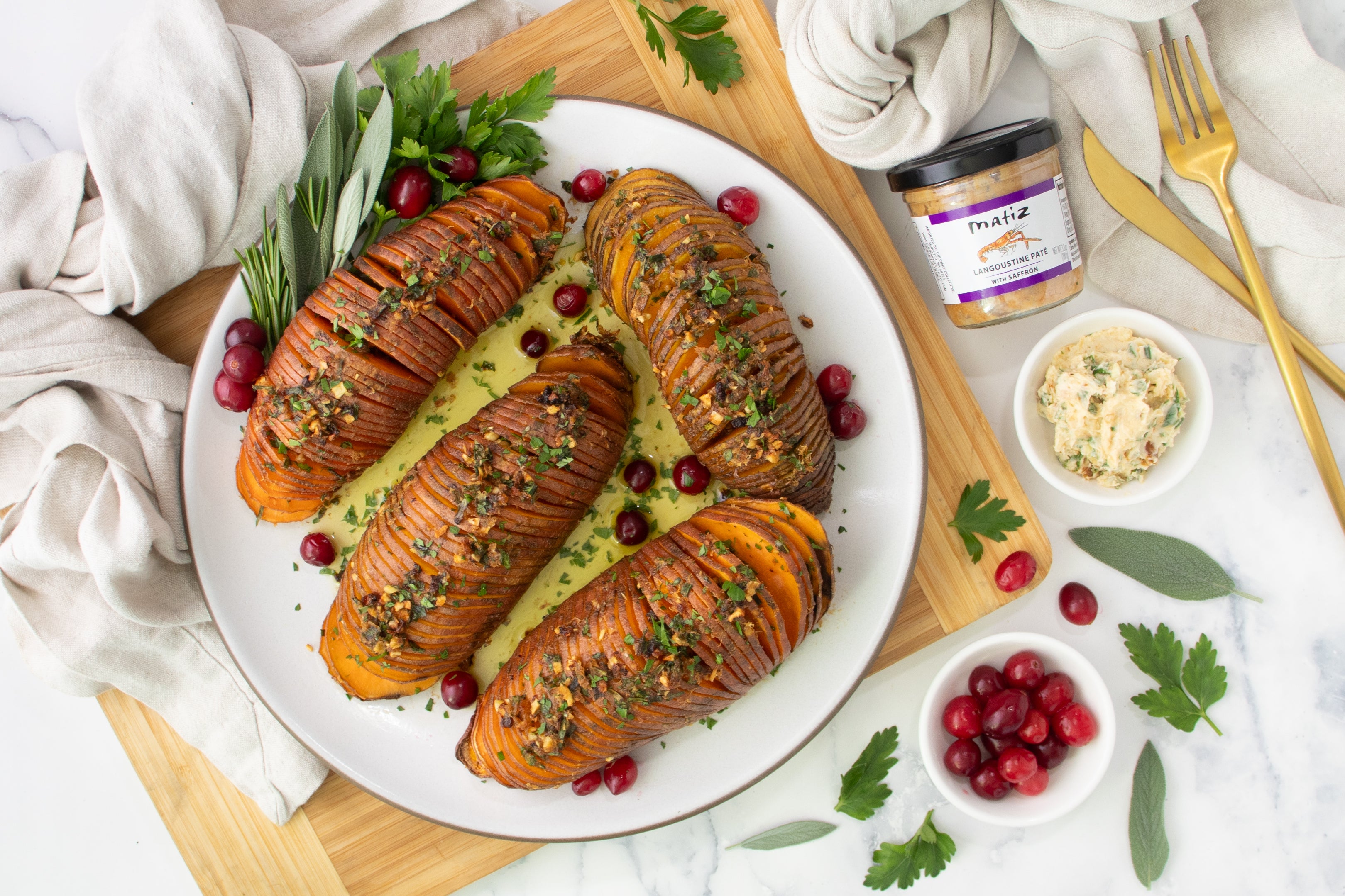 Hasselback Sweet Potatoes with Langoustine Garlic Butter