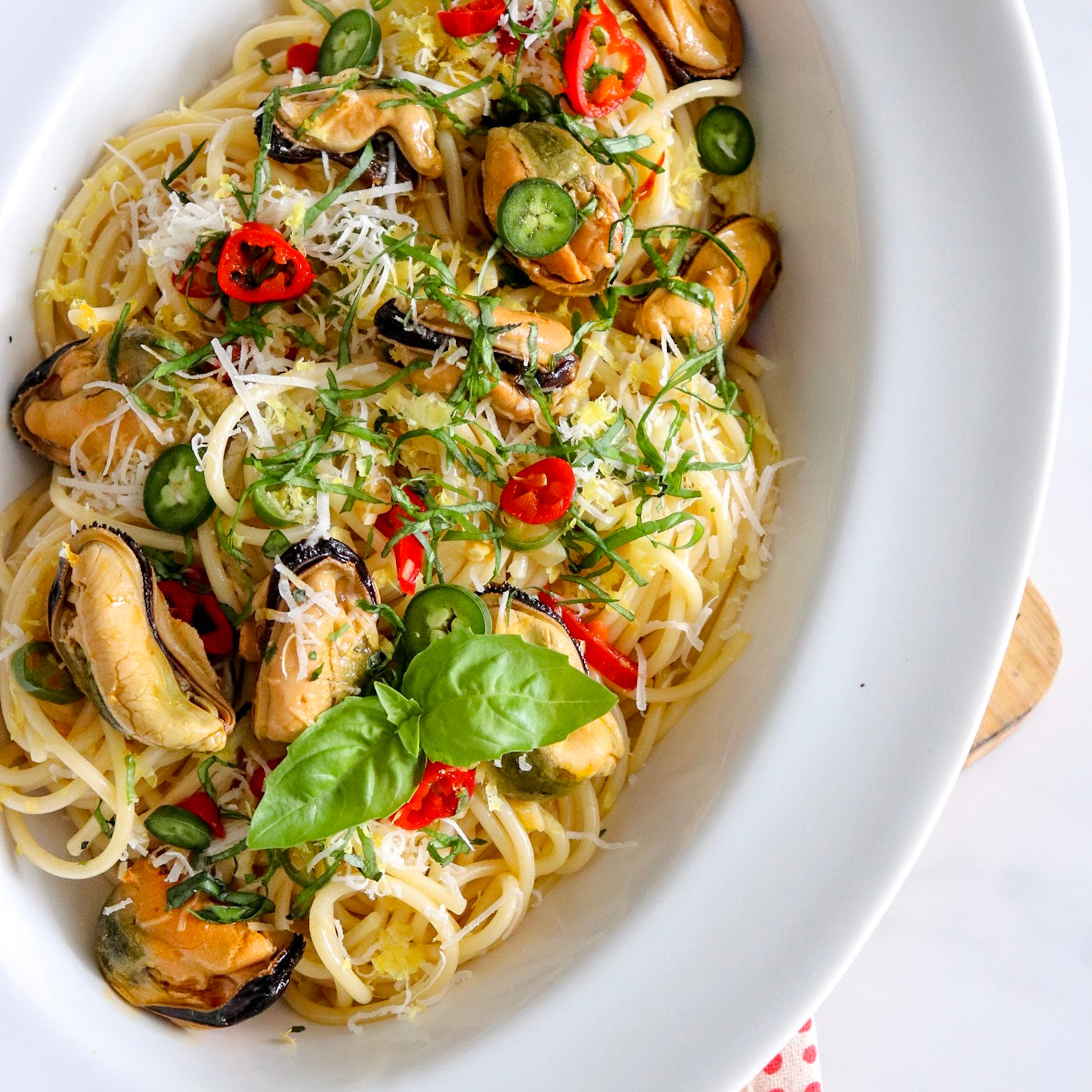 Mussels with Chilies, Basil and Lemon over Spaghetti