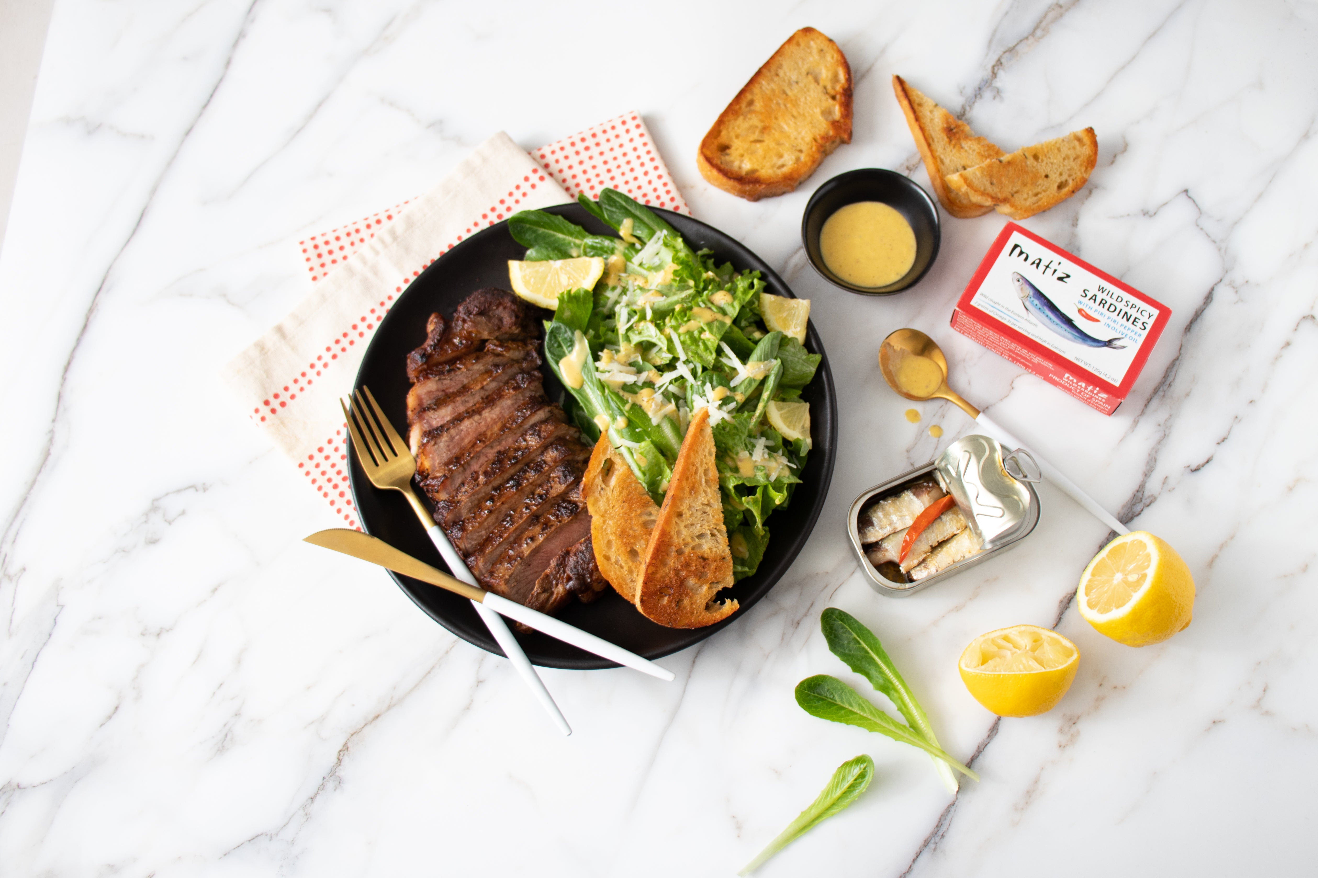 Sardine Caesar with Seared Steak and Pan-Dripping Croutons